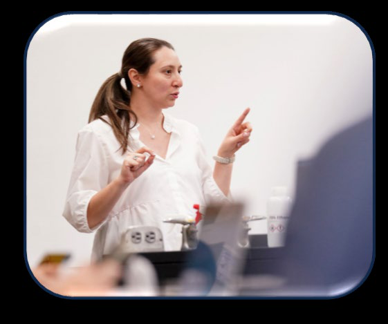 Women presenting and pointing