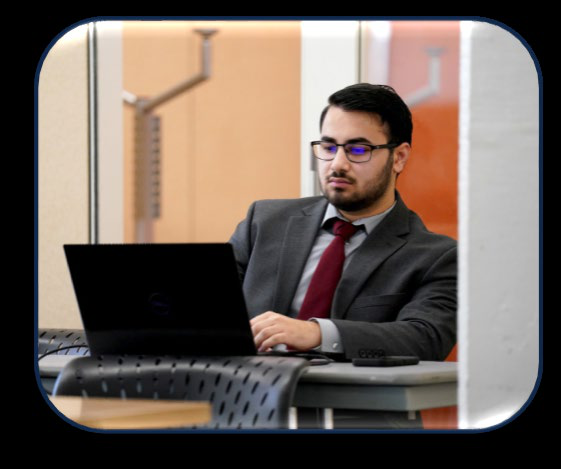 Man typing on computer