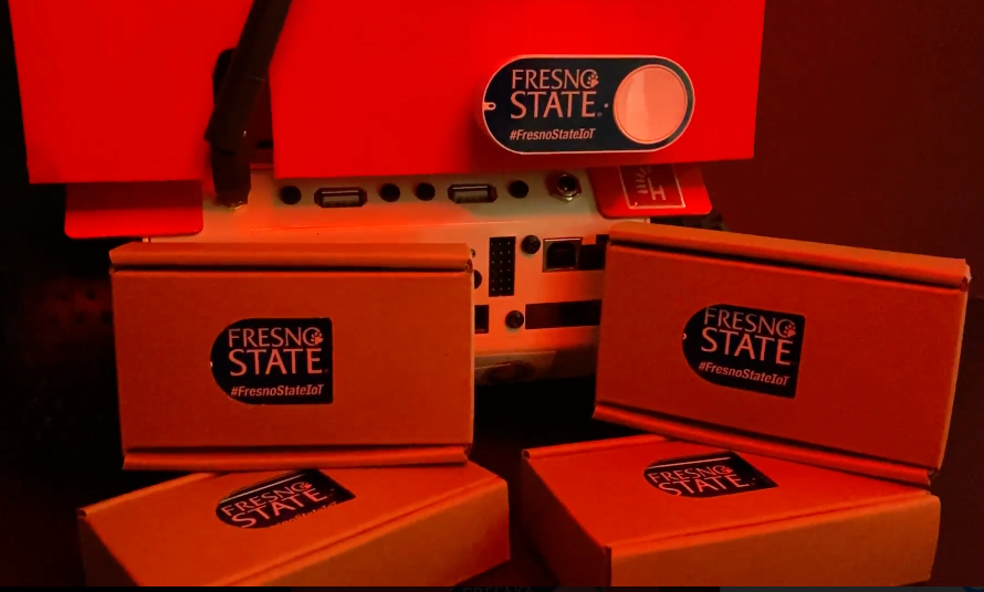 photograph of the button and it's boxes that are kept in