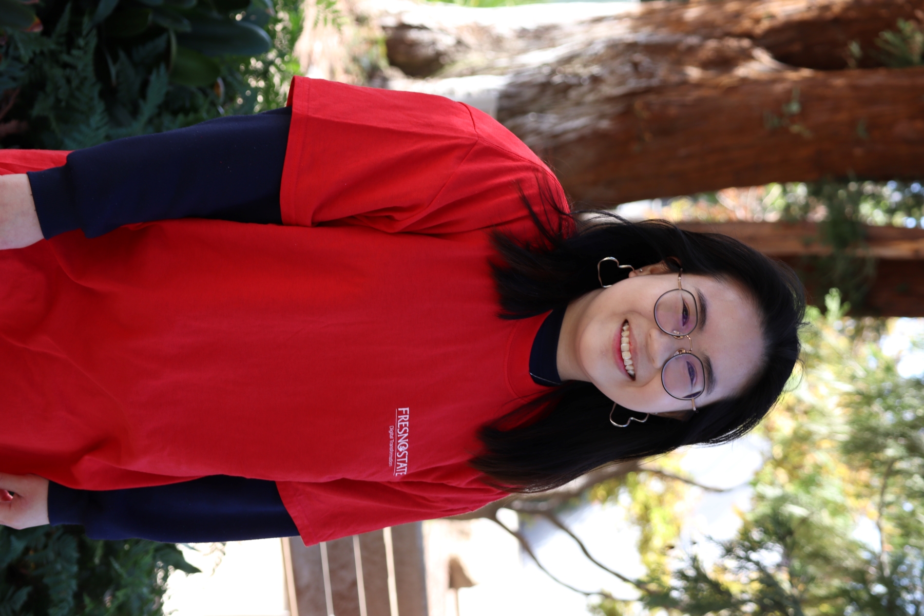 headshot of Rachel smiling