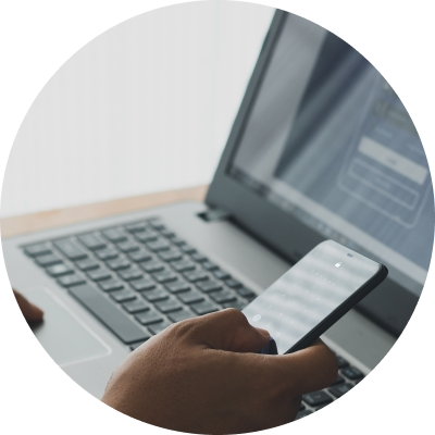 mobile phone and laptop photograph